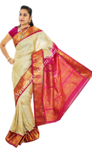 The Perl White With Pink Contrast Boarder in Roll Gadwal Silk Saree.